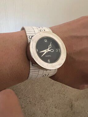 seamstress‑themed quartz watch